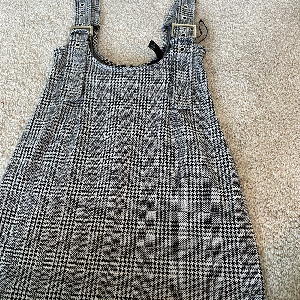 This is a skirt/dress that you were a shirt or tank top under. Size XS.